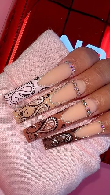 Notpolish-Thao on Instagram: "M20-Velvet Teddy, disco liner gel, matte if topcoat and non curve coffin tips from @notpolish_nails 🤎🤎 🤎 💖 🌻 #notpolish#nailart #nailsoftheday #nails2inspire #calinails#sdnails#sdnailartist#nailstagram#nails2inspire #nail #nails #longnails #nailswag#nailporn #nailpolish #nails2inspire #nailmagazine#nailpromagazine #nailsofig #nailsonfleek#nailsonpoint #nailedit #photooftheday #photography#handpaint" Pink Cowgirl Nails, Western Theme Nails, Paisley Nails, Paisley Nail Art, Cowgirl Nails, Notpolish Nails, Coffin Tips, Bandana Nails, Nails Inspiration Pink