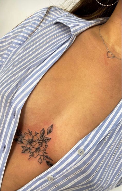 You know what's worse than having a messed up tattoo design on your skin forever? Getting called out about that epic fail online. Small Sternum Tattoos For Women, Flower Tattoos Sternum, Sternum Leaf Tattoo, Tattoos For Women Sternum, Breast Reduction Tattoo Cover Up, Sternum Tattoo Unique, Women’s Sternum Tattoo, Breast Bone Tattoos For Women, Tattoo Below Breast