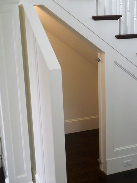 Hidden Door to storage. Toby Leary Fine Woodworking - entrances/foyers - traditional staircase, hidden nook, hidden storage nook, faux panels, faux paneling, faux s... Door Under Stairs, Stairway Storage, Understair Storage, تحت الدرج, Closet Under Stairs, Wainscoting Stairs, Hidden Doors, Wainscoting Styles, 1st House