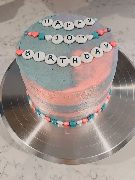 New eras birthday cake featuring bracelet lover theme Swiftie Birthday Cake, Lover Cake Taylor Swift, Taylor Swift Themed Birthday Cake, Taylor Swift Birthday Cake Ideas, Eras Tour Cake, Taylor Swift Themed Cake, Taylor Swift Cake Ideas, Swiftie Cake, Eras Cake