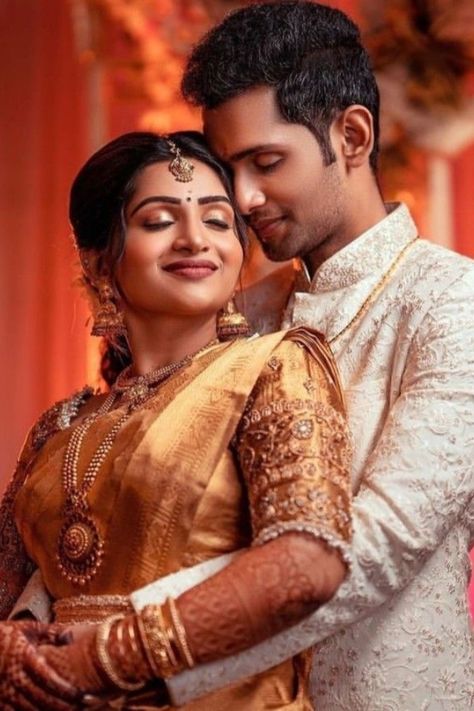 Here are Some BEST Couple Photography Ideas & Poses for South Indian Couples that you MUST need to capture for your wedding functions. #weddingbazaar#indianwedding #coupleweddingphotography #coupleweddingphotographyindian #coupleweddingphotographyposes #coupleweddingphotographyforeheadkisspicture #coupleweddingphotographyromantic #coupleweddingphotographyphotoposes #southindianweddingphotography #southindiancouplephotoshoot #southindiancouplephotoshoottraditional #southindiancouplephotoshootpose Tamil Wedding Couple Poses Photography, Copal Poses, Indian Wedding Photography Poses Couples, Traditional Couple Poses, Reception Pose, Engagement Poses Ideas, Muslim Bride And Groom, Couple Stills, Photography Poses Couples