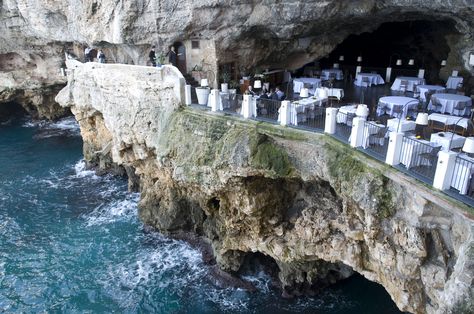 Carved into a crevice of limestone rock face is the Grotta Palazzese Hotel and Restaurant. Europe Restaurant, Grotta Palazzese, Edge Of A Cliff, Limestone Caves, Limestone Rock, Dream Landscape, Italian Lifestyle, Romantic Restaurant, Rock Face