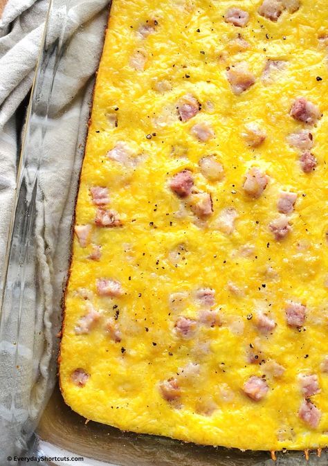 Easy Ham Egg and Cheese Casserole Spam And Egg Casserole, Easy Ham And Egg Breakfast Casserole, Overnight Ham And Cheese Egg Bake, Ham Scrambled Eggs, Egg And Ham Bake, Ham Potato Egg Breakfast Casserole, Egg Bake Ham And Cheese, Eggs Ham Cheese Breakfast, Breakfast With Ham And Eggs