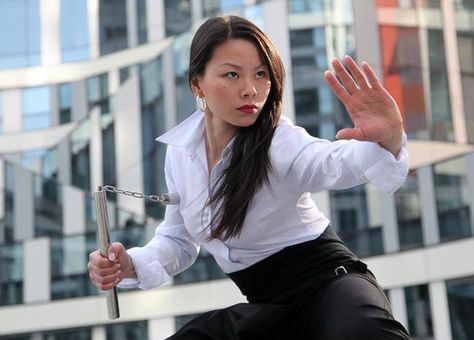 Nunchucks or Nunchaku Nunchucks Pose Reference, Nunchucks Poses, Martial Arts Photography, Art Martial, Woman Warrior, Nunchucks, Female Martial Artists, Martial Arts Movies, Martial Arts Girl