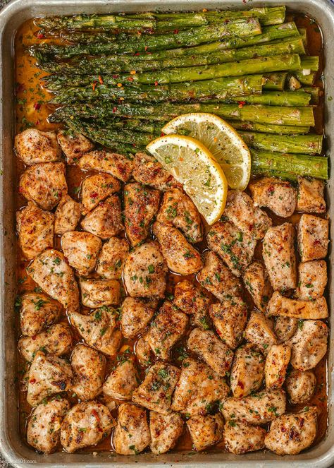 Lemon Garlic Butter Chicken Bites with Asparagus - #baked #chicken #recipe #asparagus #eatwell101 - The chicken bites are so juicy, tender, and delicious you’ll eat them hot right off the sheet pan! CLICK HERE to Get the Recipe - #recipe by #eatwell101® Garlic Butter Chicken Bites With Lemon Asparagus, 2 Person Chicken Recipes, Essen, Thermomix, Healthy And Easy Chicken Recipes, Baked Chicken And Asparagus Recipes, Chicken Pineapple Sheet Pan Dinner, Healthy Dinner With Asparagus, Lemon Garlic Sheet Pan Chicken