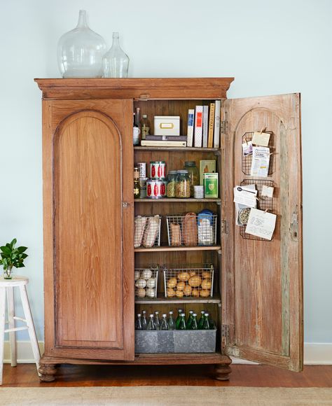 Turn an Armoire into a Pantry: No need for built-ins. Stand-alone storage, like this armoire-turned-cupboard, is one of the latest kitchen trends. Stand Alone Kitchen Pantry, Armoire Pantry, Latest Kitchen Trends, Beautiful Pantry, Vintage Armoire, Kitchen Organization Pantry, Bedroom Armoire, Kitchen Pantry Design, Kitchen Pantry Cabinets