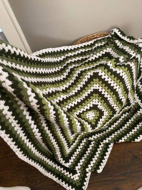 #green #crochet #blanket #handmade Amigurumi Patterns, Crochet Blanket Wool, Black And Green Crochet Blanket, Green Black And White Crochet Blanket, 4 Color Granny Square Blanket, Crochet Green And White, Crochet Dark Green, Green And Black Crochet Blanket, Granny Square Crochet Blanket Aesthetic