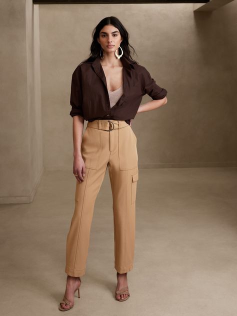 Utility with a twist, this cargo pant is crafted using a luxurious and softly structured fabric, enhanced with advanced stretch for a refined look and feel.  SLIM FIT: High waisted, slim through hip and thigh, tapered leg.  Ankle length.  Zip fly with hook and bar closure.  Removable belt.  Front, back and side cargo pockets.  Pleated detail at the cuff.  Unlined.  SLIM FIT: High waisted, slim through hip and thigh, tapered leg.  Ankle length.  Ankle length.  Inseams: Petite/Short 24", Regular 2 Professional Outfits, Banana Republic Outfits, Luxury Lifestyle Women, Cargo Pants Outfit, Clothing For Tall Women, Petite Shorts, Banana Republic Pants, Cargo Pant, Tall Women