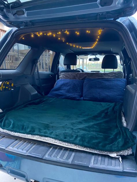 Car With Bed In Back, Sleeping In Back Of Car, Estate Car Camping, Ford Escape Car Camping, Camping In A Car, Sleeping In Car Road Trips, Camping In A Truck Bed, Camp In Car, Hatchback Car Camping