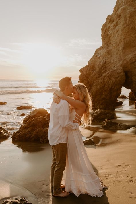 Malibu beach proposal at El Matador state beach. We spent the rest of their Malibu beach session taking engagement photos. Check out the blog post to view the gallery! Beach Photo Engagement, El Matador Beach Engagement Photoshoot, Cute Beach Engagement Photos, Couple Photos In The Ocean, Engagement Photo Inspo Beach, Beach Engagement Pictures Outfits, Beach Proposal Dress, Boho Beach Engagement Photos, Coastal Couple Photoshoot
