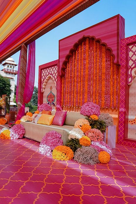 mehndi decor ideas, pink floral searing, haldi ideas, colouefull decoration, roses decor, pink inspo, indian wedding decor ,floral wedding, pink themed mehndi ceremony decoration, Mehndi Decor Ideas, Haldi Ideas, Indian Wedding Mehndi, Haldi Decoration Ideas, Haldi Ceremony Decorations, Asian Wedding Decor, Indian Wedding Theme, Mehendi Decor Ideas, Indian Theme