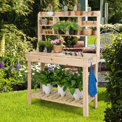 Send the potting table to your friends who are crazy gardening lovers. The potting workbench has a 3-tier shelf, a flip-up tabletop & a bottom shelf, all offer you sufficient storage for tools, flowerpots, or other sundries. More, it comes with 3 hanging hooks that keep gardening essentials easy to access. The wood workstation is made of fir wood, so it shows better sturdiness and durability. Since the tabletop is 34'' off the floor, frequent bending will be avoided, gardening would be more comf Hidden Sink, Garden Potting Bench, Garden Work Bench, Gardening Essentials, Workbench Table, Outdoor Potting Bench, Potting Tables, Tier Shelf, Potting Table