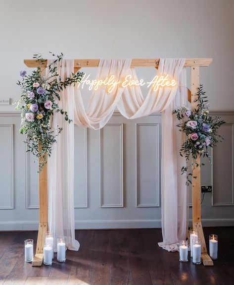 Obsessed. 😍 My current wedding obsession is this dreamy ceremony arch, draped in cascading chiffon and dressed with seasonal spring blooms. Large scale pieces like this are 👌 perfect 👌 for your wedding ceremony, they create a focal point in your space and frame you and your partner as you exchange vows. Later, they can repurposed as a photo backdrop (the neons are great for this) or positioned behind your top table during your reception. Endless possibilities! @lauramayphotographyuk ... Draping Arch Wedding, Fireplace Backdrop Wedding, Wedding Arch With Drapes, Drape Wedding Backdrop, Wedding Backdrop Head Table, Wedding Draping Backdrop, Chiffon Backdrop, Head Table Wedding Backdrop, Sweetheart Table Backdrop