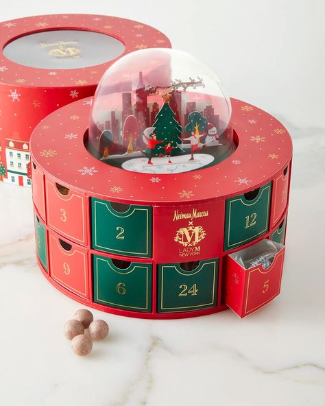 No time to DIY? No problem! If you don't have the time to make your own but love the idea of advent calendars, check out the beautiful creations by Neiman Marcus. Some of them are made to be reused so you can continue to create memories every Christmas for years to come. Christmas Snowglobe, Advent Box, Advent Calenders, Christmas Hamper, Lady M, Box Packaging Design, Advent Calendars, Christmas Packaging, Christmas Advent Calendar