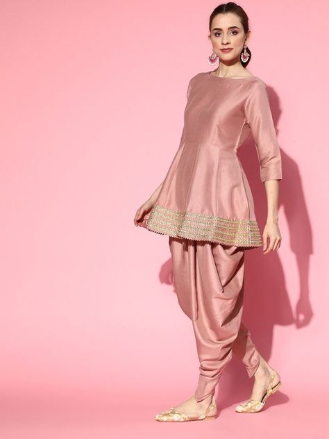 Buy pleasing dirty pink panelled kurta with dhoti pants and organza dupatta for women which is crafted from silk blend fabric. This beautiful style kurta set goes perfectly for upcoming festive season and grand events. Dhoti Kurta Sets For Women, Dhoti Suit Design For Women, Pink Dhoti Outfit, Peplum Kurti With Dhoti Pants, Kurta Set With Organza Dupatta, Frock Kurti With Dhoti Salwar, Kurti Dhoti For Women, Frock And Dhoti Salwar, Dhoti Pant Suits For Women