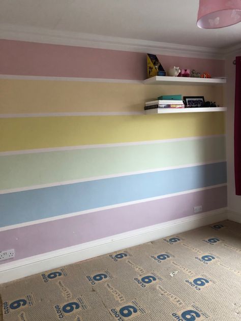 Rainbow bedroom wall Pastel Rainbow Wall Mural, Rainbow Paint Ideas For Walls, Rainbow Wall Paint Girl Rooms, Rainbow Paint Bedroom, Pastel Rainbow Painted Wall, Pastel Rainbow Bedroom Decor, Half Paper Half Paint Wall, Pastel Rainbow Accent Wall, Pastel Rainbow Stripe Wall