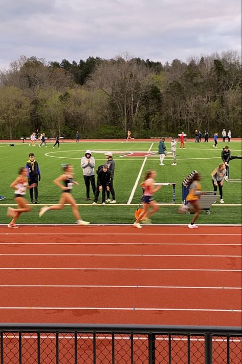 College runners in different uniforms racing on a track in this blurry photo Vision Board Track And Field, Kids Track And Field, Track Running Aesthetic, Track Season Aesthetic, Track Asethic, Running Asethic, College Athlete Aesthetic, Track Aesthetic Running, Running Astethic