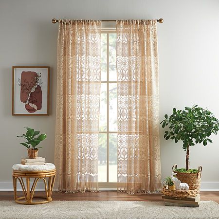 Create an inviting space and unique bohemian look in your home. The sheer lace panel with a fringe hem will send your boho heart racing with its delicate details. This panel will gently filter light for a bright appearance in your home. Number of Panels: 1Included: 1 Panel(s)Features: Easy CareTop Construction: Rod PocketTop Opening: 1 1/4 In Rod PocketUse: IndoorFiber Content: 100% PolyesterFabric Description: KnitLining: UnlinedLight Filtration: Light-FilteringCare: Machine WashCurtain Length: Ivory Curtains, Lace Curtain Panels, Boho Curtains, Sheer Curtain Panels, Drapery Rods, Lace Curtains, Boho Lace, Boho Living, Colorful Curtains