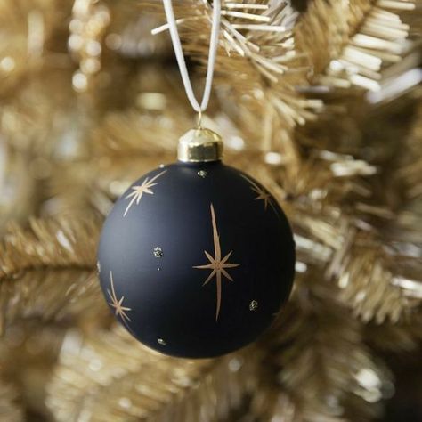 an elegant black and gold Christmas ornament with rhinestones and stars is a cool decoration for the holidays Natal, Witchy Picnic, Black And Gold Christmas Decor, Gold Christmas Decor Ideas, Dark Academia Christmas, Black And Gold Christmas, Yuletide Decorations, Gold Christmas Decor, Black Christmas Decorations