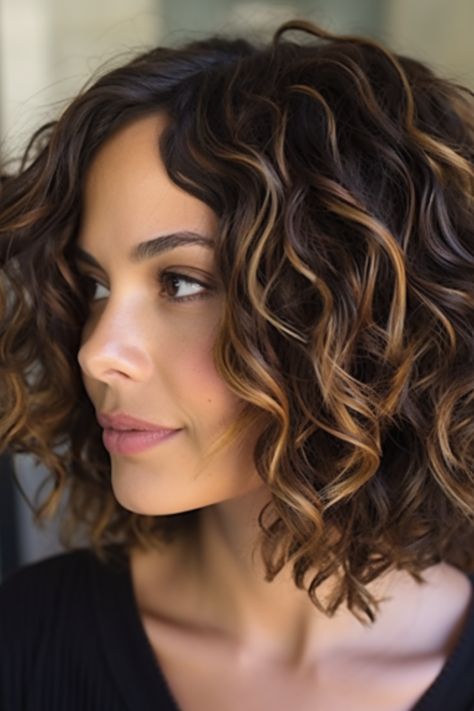Get ready to turn heads with a curly-layered bob featuring dark roots for an edgy contrast. The dark roots add depth and give your curly layers a grunge vibe. Click here to check out more stunning medium-length layered haircuts trending right now. Medium Length For Curly Hair, Curly Short Highlights, Waves Curls Hairstyles, Mid Length Curly Hair Balayage, Partial Highlights For Dark Hair Curly, Honey Balayage On Dark Hair Curly, Shoulder Length Curly Hair Balayage, Curly One Length Haircut, Naturally Wavy Haircuts Medium