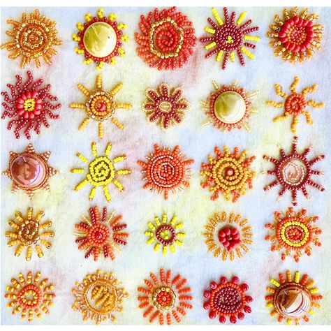 It's summer and the heat is on!  Colorado has a lot of sunny days, so I was inspired to do a quilt-like sampler of sun designs.  There are 25 different sun designs using a simple palette of yellows, oranges, and reds.  In this design I use a number of different bead finishes such as crystal, matte, and shiny.  It measures 6.75 inches by 7 inches. The design is printed in color on a stitch-able backing fabric.  Lit instructions include bead colors and sizes, and additional supplies you'll need, a Flower Bead Embroidery Designs, Bead Embroidery Hair Accessories, Sun Bead Pattern, Floral Beaded Embroidery, Beaded Embroidery Stitches, Bead Embroidery Templates, Beaded Fish Embroidery, Red Bead Embroidery, Beaded Embroidery Inspiration