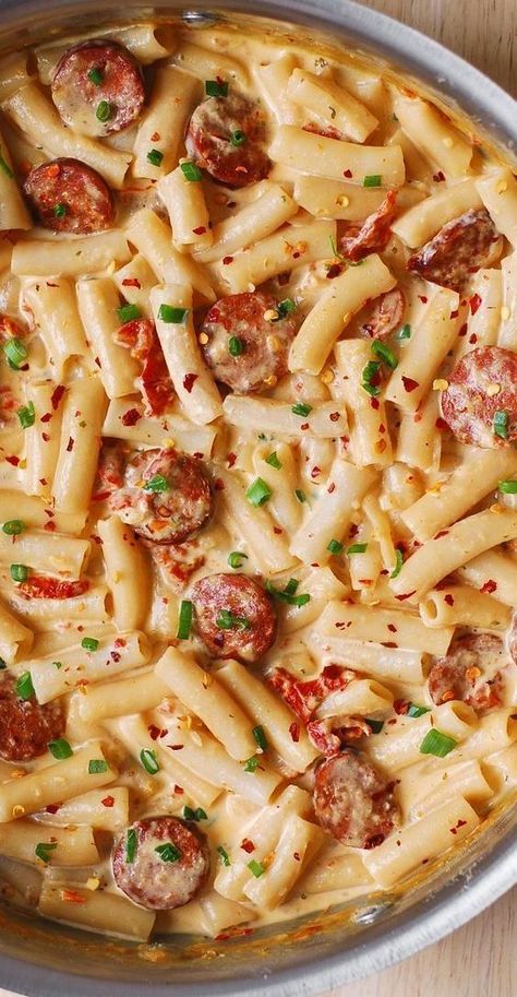 Creamy Mozzarella Penne Pasta with Smoked Sausage in a stainless steel pan. Creamy Mozzarella Pasta With Sausage, Beef Sausage Pasta Recipes, Smoked Sausage And Pasta Recipes, Smoked Beef Sausage Recipes, Spicy Mozzarella Pasta, Recipes With Smoked Sausage, Recipes Using Smoked Sausage, Creamy Mozzarella Pasta, Creamy Pasta With Sausage