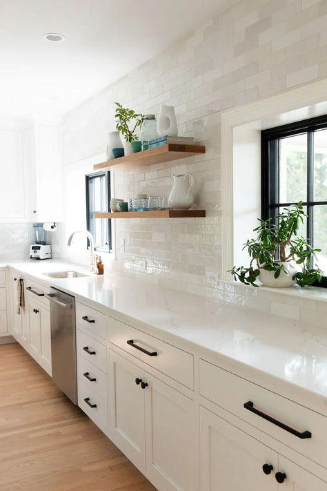 White Marble Kitchen Decor Ideas, Backsplash White Cabinets Grey Counter, Shaker Style Cabinets White, White Back Splash Patterns For Kitchen, Kitchen With Mudroom Entry, White Hood With Wood Trim, Shiny Kitchen Backsplash, White Tile Countertops Kitchen, Black Kitchen Accents
