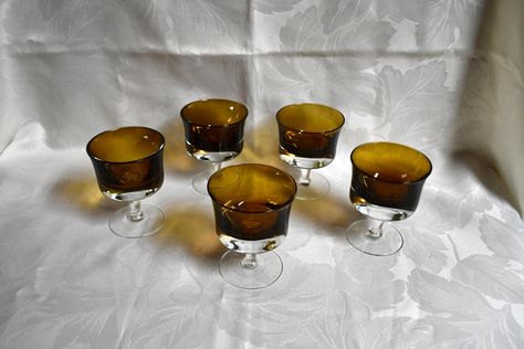 Vintage Set Of Five Denby-Milnor Crystal Of Sweden Mirage Brown/Amber - Cocktail/Wine/Champagne/Sherbert - 4 Inch Stemmed Glasses - EUC In excellent pre-owned condition.  No major condition issues I see.   Measures approximately 4.2" tall" x 3.4" wide (diameter).  Glasses hold approximately six ounces. I try to point out any flaws & condition issues I am aware of & try to accurately assess the condition in my opinion and to be as transparent as I can be. Your opinion may differ from mine, so please see my pictures & judge for yourself.   Although I try to remember to give the item a light cleaning before I ship it,  your item may need a light cleaning.   Please feel free to ask any questions & I will do my absolute best to answer them.  I am a collector of many things, but an expert on non Champagne, Sweden, I Ship It, Try To Remember, Your Opinion, Labour Day, 4 Inch, My Pictures, Amber