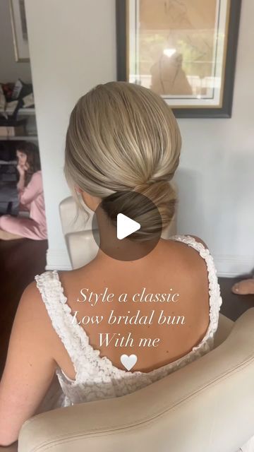 Kristen Okaly on Instagram: "Danielle 🤍 classic low buns always 🫶🏻 Mua @byalyssaa  . @sexyhair powder play . #bridalbun #updotutorial #njbridalhair #njhairstylist #updoeducator #njbride #brideinspiration #weddingreels #bridereels #parkchateauwedding #bridalhairstyle #classicbridalhair #bridalhairideas #njweddings #updoideas #bridetobe2025" Low Bun Chignon, Simple Side Bun Wedding Hair, Low Bun With Front Pieces Curled, Low Hair Dos For Wedding, Chic Bun Wedding Hair, Low Bun Wedding Hair Step By Step, Low Bun Wedding Hair For Long Hair, Simple Bridal Bun Hairstyles, Twisted Updo Wedding