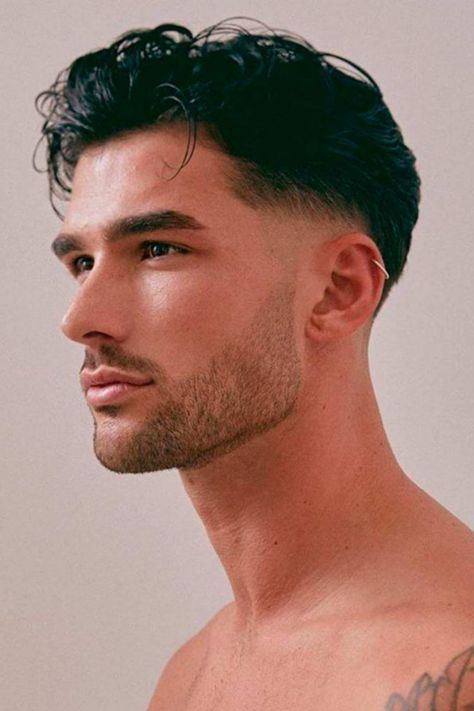 A young man with a wet, messy pompadour haircut, shirtless. Handsome Mens Haircuts, Haircut For Medium Hair Men, Mens Short Wavy Hair, Medium Wavy Haircuts Men, Short Haircuts For Men With Thick Hair, Long Hair Men Style Medium, Men Hair Undercut, Mens Short Wavy Hairstyles, Undercut Hair Men