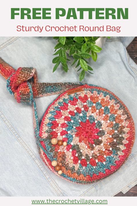 Craft your own Boho Chic round bag with our free crochet pattern. Stylish and practical, this accessory is perfect for adding flair to any outfit. #freecrochetpattern #bagpattern #freecrochetbagpattern #thecrochetvillage #bohocrochetbag #crochetroundbag Easy Crochet Patterns To Sell, Circular Crochet Bag, Round Crochet Purse Free Pattern, Crochet Round Purse Pattern Free, Quick Crochet Projects To Sell Free Pattern, Crochet Circle Bag Pattern Free, Crochet Round Purse, Crochet Round Bag Free Pattern, Crochet To Sell Ideas Free Pattern