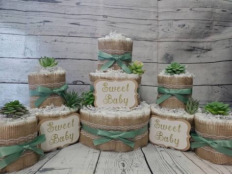 "💖Diaper Cake 5 Piece Set💖 Already assembled Ready for gift giving! The perfect gift for any Baby Shower 🦋5 Diaper Cakes included: 1 - 3 Tier Cake 2 - 2 Tier Cakes 2 - Mini 1 Tier Cakes 🦋Appr. Size for 3 Tier Cake 10\" W x 14\" H. 🦋102 Diapers Included (You Choose the Brand and Size!) 🦋100% Usable Diapers (No Glue or Tape Used) 🦋All Diaper Cakes come fully assembled and wrapped in Tulle 🦋We can personalize a note with baby name and/or message inside! (Keep Scrolling for Details!) 🦋Check Cake For Baby Shower, Baby Shower Neutral, Diaper Bouquet, Succulent Theme, Cake For Baby, Mini Diaper Cakes, Diaper Cake Centerpieces, Neutral Shower, Eucalyptus Green