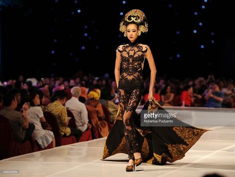 A model showcases designs by Anne Avantie at the Merenda Kasih show during her 25th anniversary as a fashion designer at Pakuwon Imperial Ballroom on November 1, 2015 in Surabaya, Indonesia. Anne Avantie is a leading contemporary kebaya designer in Indonesia. Surabaya, Kebaya Fashion Show, Anne Avantie, A Fashion Designer, Exotic Fashion, November 1, 25th Anniversary, Kebaya, Showcase Design