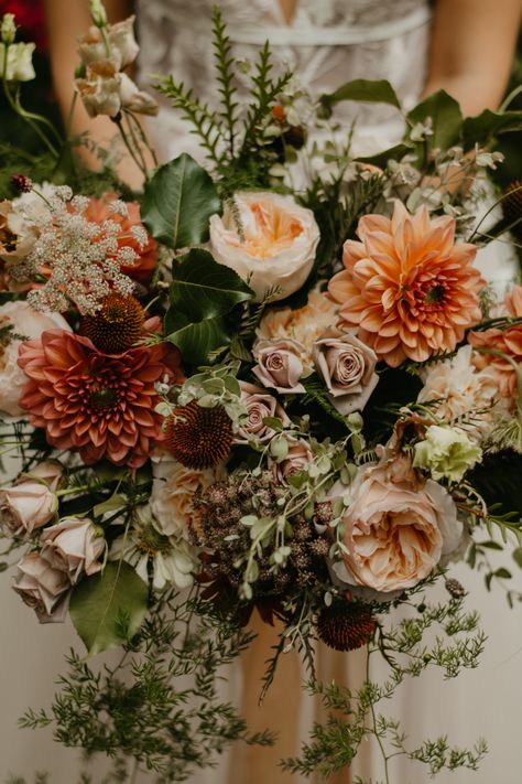 Peach, burnt orange, dusty rose; these are marvelous colors for a unique and inviting autumn wedding. Flowers for a Fall wedding bouquet. Flowers for an October or November wedding in New Jersey or New York. Follow for more wedding inspiration! | NJ Wedding Florist, A Petal to Peddle | Always bespoke. Never Basic. Fall Wedding Flowers Wildflowers, Rustic Fall Wedding Flowers Bride Bouquets, September Wedding Rustic, Muted Fall Bouquet, Ethereal Fall Wedding, Fall Wild Flower Bouquet Wedding, September Wildflower Bouquet, Fall Wedding Bridesmaid Bouquets, Fall Wedding Bouquets Bridesmaids