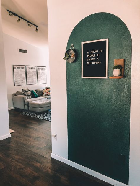 Green living room // green arch \\ painted arch Entryway Painted Arch, Hallway Arch Paint, Arch Wall Entryway, Arched Wall Painting, Entryway Arch Paint, Wall Painted Arch, Arch Painted On Wall Living Room, Painted Arch Hallway, Wall Paint Arch Designs