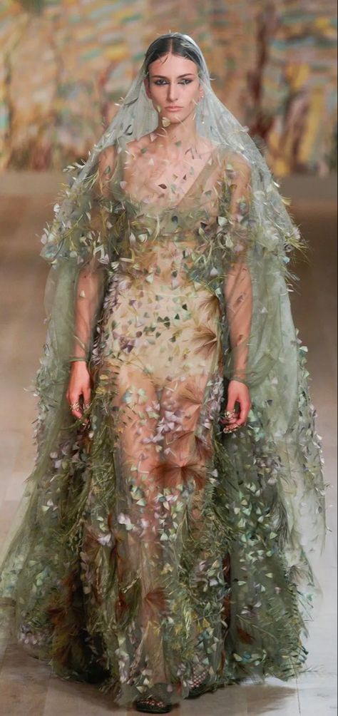 The couture equivalent of an enchanted walk through a forest, the romantic closing look was veiled in invisible tulle and embroidered with thousands of trimmed and tinted feathers by Maison Lemarié to evoke plants and flowers. Couture, Enchanted Forest Prom, Floral Dress Fashion, Greek Flowers, Forest Dress, Dolce And Gabbana Fashion Show, Forest Fashion, Fashion Walk, Nature Dress