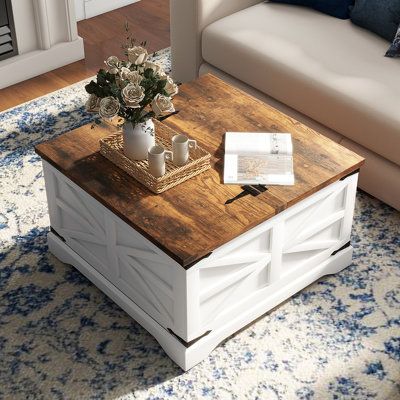 Upgrade your living space with our square lift top coffee table. Embrace the charm of farmhouse design, enjoy the convenience of the lift top feature and large hidden storage compartment, appreciate the durability and stability of the MDF material, and relish the hassle-free assembly. Create a cozy and organized environment for your family and friends. Table Base Color: White/Brown | Gracie Oaks Gulkis Farmhouse Square Storage Coffee Table w / Hinged Lift Top for Living Room Wood in Brown | 17.9 Lift Top Coffee Table Makeover, Coffee Table White And Wood, Coastal Coffee Table Decor, Farmhouse Livingroom Decor, White Coffee Table Living Room, Ottoman Coffee Table Decor, Refurbished Coffee Tables, Friends Table, End Tables Living Room