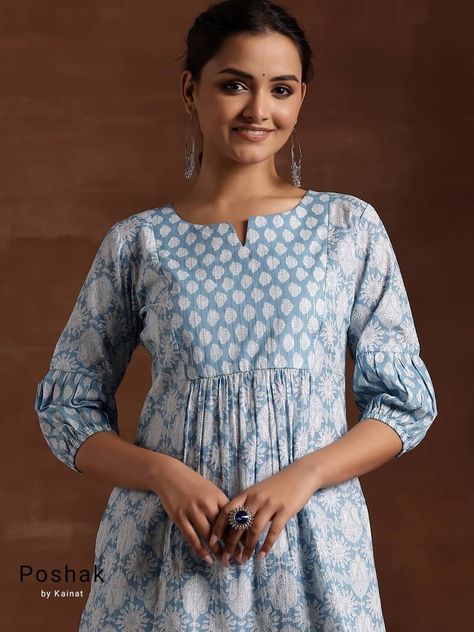 Blue& White  Printed A-line Cotton Tunic Top /Kurti For Women Short Kurta For Women- This outfit is made with the finest Cotton  of India. The set contains : 1  Kurti Kurti: Blue floral printed A-line top kurti/tunic comes with a  round notched neck ,flared  hem.  Sleeve length :  3/4 Sleeves   Material : Kurti :  Cotton Fabric Care : Machine wash Front length : 30 inches Please see the photo section  to choose a perfect size for yourself.  *Please note the color of the item may slightly vary du Indian Tunics For Women, Kurti Cotton, Tunic Kurti, Tunics For Women, Kurta Top, Kurti For Women, Cotton Tunic Tops, Indian Tunic, Summer Tunic