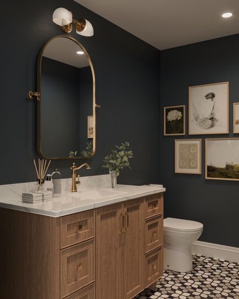 Who loves a moody powder room - we do!! 👋🏻👋🏻 - - - - - - - #interiordesign #interiordesigner #homedecor #homedesign #interiorinspo #interiordecorating #interiorstyling #interiordetails Dark Bathroom Gold Accents, Black And Gold Finishes In Bathroom, Dark Blue Moody Bathroom, Moody Small Powder Room, Statement Guest Bathroom, Dark Moody Guest Bathroom, Small Bathroom Black Walls, Midcentury Powder Room Ideas, Traditional Downstairs Toilet