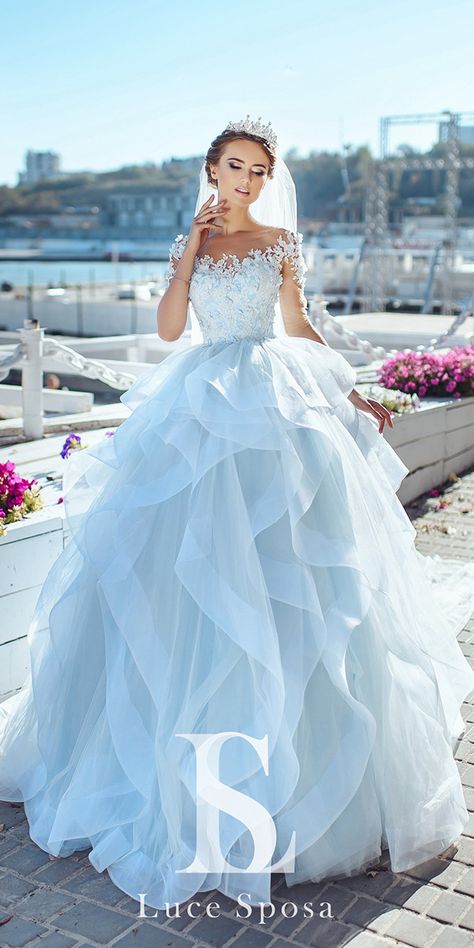 18 Dreamy Blue Wedding Dresses To Inspire ❤ blue wedding dresses pale ball gown with long illusion sleeves ruffled skirt louse sposa ❤ Full gallery: https://weddingdressesguide.com/blue-wedding-dresses/ #bride #wedding #bridalgown Wedding Dresses Sky Blue, Light Colored Wedding Dresses, Colored A Line Wedding Dress, Light Blue Wedding Dress Cinderella, Wedding Dresses Ocean, Blue Wedding Gowns With Sleeves, White And Baby Blue Wedding Dress, Nautical Wedding Dress The Bride, Long Sleeve Wedding Dress Blue