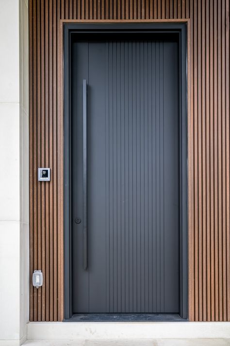 Modern wood front door designed and masterfully crafted by Arista Doors. #aristadoors #solidwooddoor #doormanufacturer #architecture #wooddoors #exteriordoors #carpentry #exteriordesign #torontoarchitecture #canadianarchitecture #frontdoor #frontdoordesign #moderndoor #modernfrontdoor Modern Black Exterior Door, Enter Door Design House, Modern Front Doors Contemporary, Black Front Door Modern, Door Design Modern Luxury, Door Design Modern Bedroom, Black Modern Front Door, Front Door Design Modern, Modern Black Front Door