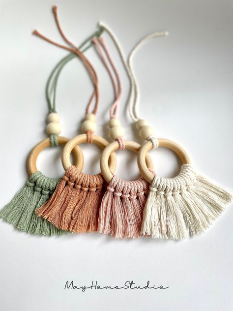 "This macrame ornament is great to add a Boho touch to your car, a bag, nursery, bedroom or any place. Also it is perfect for small gifts or party favors. It is Eco-friendly, made with 100% cotton cord, wooden ring and beads. Width is 3\", height with wooden beads is approx. 6\". The cord on top is left untied to be able to adjust to your desired length. To hang the ornament, you can simply tie the strings to the object of your choice.  If you want to use this ornament as a diffuser, you can sim Macrame Wreath Ornament, Tassen Hanger, Wooden Rings Craft, Macrame Car Charm, Essential Oil Car Diffuser, Macrame Wreath, Pola Macrame, Cactus Keychain, Macrame Rings