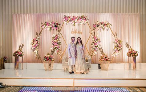 Engagement Banquet Hall Decor, Simple Photobooth Ideas For Wedding, White Background Stage Decoration, Small Wedding Stage Decorations, Small Indian Wedding Decor, Engagement Stage Design, Wedding Hall Stage Decoration, Banquet Stage Decorations, Small Wedding Reception Decorations