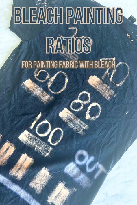 black shirt with bleached numbers written on it to show the different strengths of each ratio of bleach to water as well as a sample of what out white bright looks like on a black shirt. Bleach Painting Denim, Fabric Bleach Art, Bleach Textiles, Bleach Fabric Art, How To Paint With Bleach, How To Make A Bleached Shirt, How To Bleach Paint A Shirt, Bleach Paint Designs, Bleach Printing On Fabric