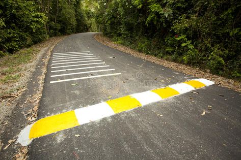 Speed bump. Yellow and white strip speed bump on road #Sponsored , #ad, #affiliate, #bump, #speed, #road, #Yellow Yellow, Speed Bump, Bump, Transportation, Royalty Free Stock Photos, Stock Images, Road, White