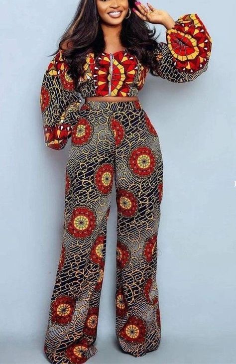 Beautiful patterns that brighten up any outfit #KitengeTop #pinninglif #makeu Ankara Two Piece, Ankara Trouser, African Skirt Outfit, Chitenge Outfits, Ankara Pants, African Pants, Ankara Trousers, Pant Dress, African Print Pants