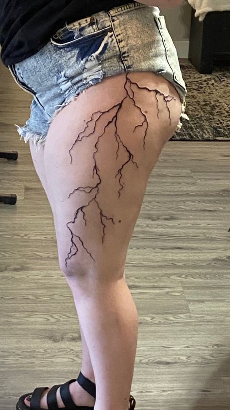 Lightning strike thight tattoo Lightning Strikes Tattoo, Lightning Bolt Tattoo Thigh, Lighting Tattoo Thigh, Thigh Lightning Tattoo, Lighting Tattoo On Thigh, Lightning Tattoo Women Leg, Lightning Tattoo On Thigh, Hip Tattoos Women Lightning, Full Body Lightning Tattoo