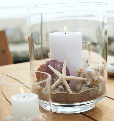 Clear Glass Hurricanes | Decorating Ideas with Candles, Beach Sand, Shells, & more - Coastal Decor Ideas Interior Design DIY Shopping Glass Vase Filler Ideas, Glass Vases Decor Ideas, Candle Holder Ideas, Jar Decorating Ideas, Candle Decorating, Beach Candle Holder, Vase Filler Ideas, Large Glass Vase, Glass Vase Decor