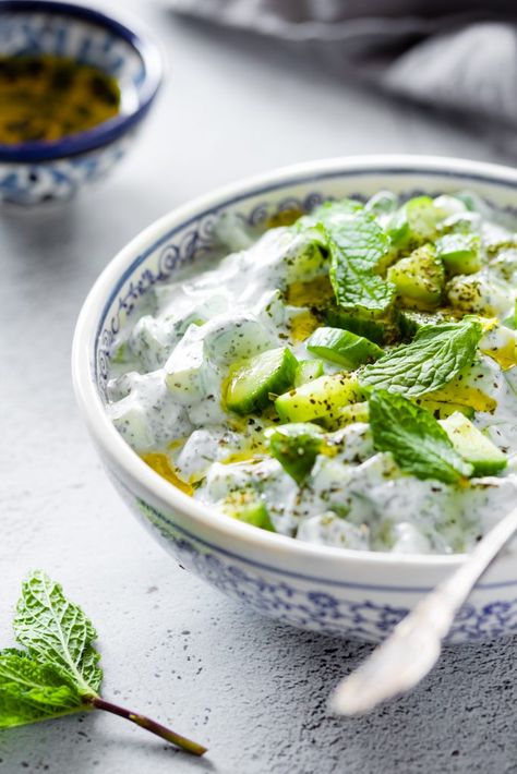 Jajik is a refreshing yogurt salad made with cucumbers, mint and garlic. It's the perfect side to serve with grilled meat or rice. Must try! Essen, Middle Eastern Lentil Soup Recipe, Hungry Paprikas, Middle Eastern Lentil Soup, Cucumber Mint Salad, Cucumber Yogurt Salad, Ramadan Recipes Iftar, Yogurt Salad, Salad Cucumber