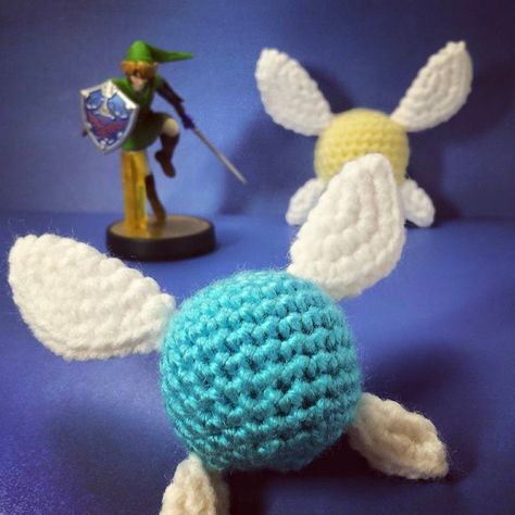 Here’s my free pattern for Navi! As always, if you have any questions about the pattern just let me know :) This pattern can also be used to make Tatl, another fairy from Legend of Zelda. Jus… Navi Crochet Pattern, Legend Of Zelda Crochet Pattern Free, Gaming Crochet Patterns, Crochet Legend Of Zelda, Zelda Crochet Patterns, Crochet Fairy Pattern, Legend Of Zelda Crochet, Crochet Zelda, Navi Fairy